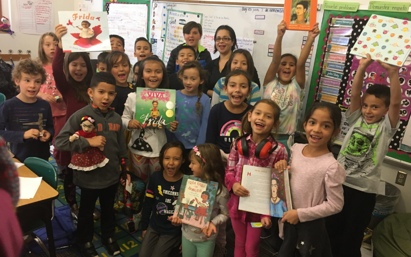 Ms. Antillon's class at Coronado Elementary in Albuquerque New Mexico holding books they used to write about Frida Kahlo.
