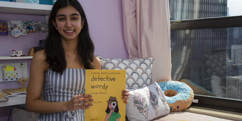 Riya Joshi posing with her book Detective Wordy.